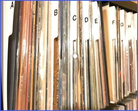 arranging albums in alphabetical order - rock vinyl revival