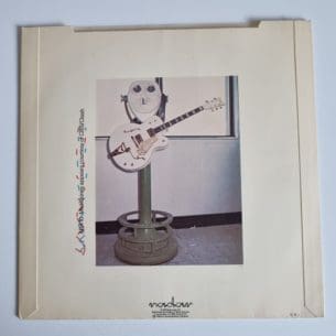 Buy this rare Elvis Costello record by clicking here